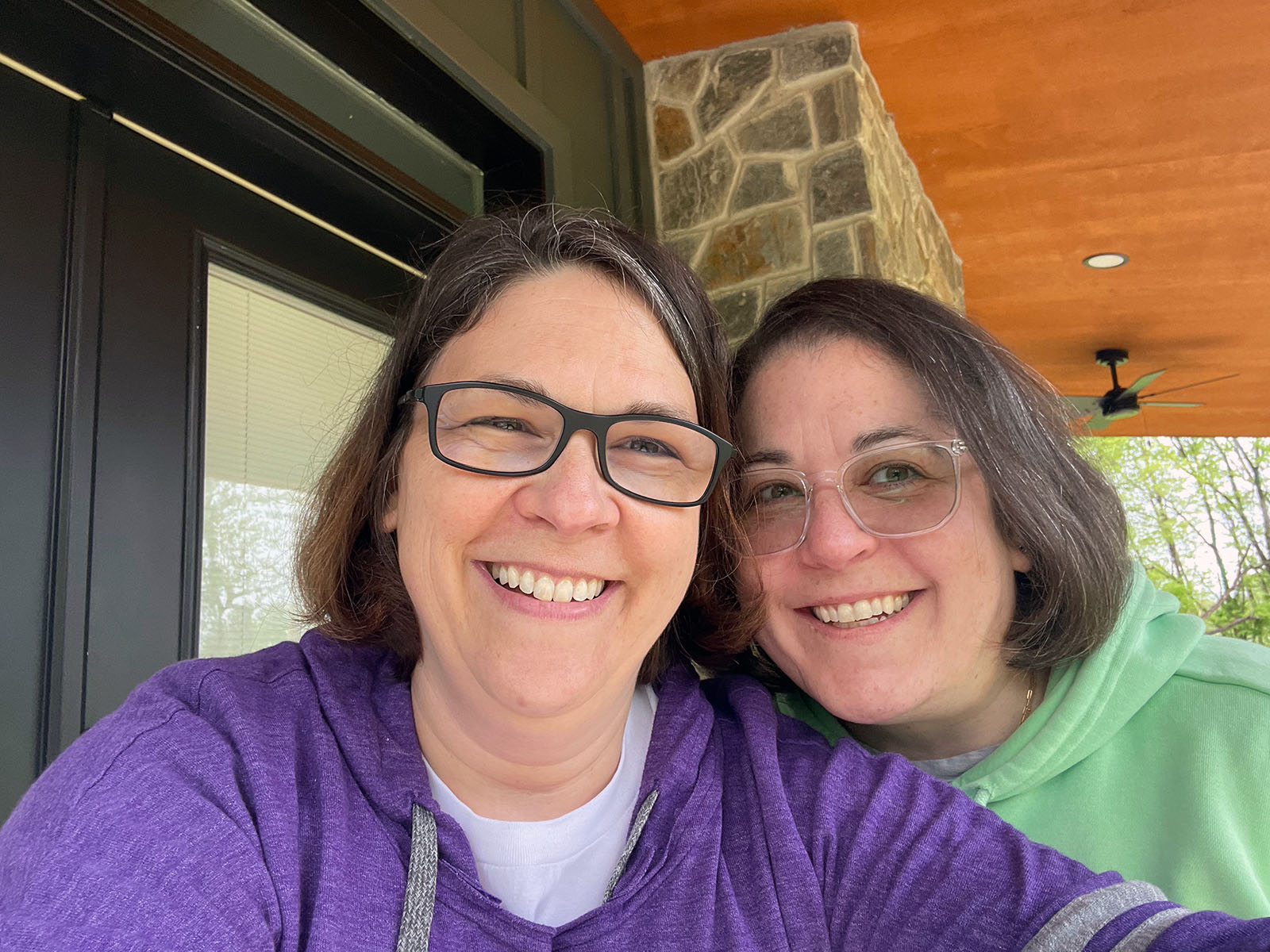 Selfie of two women smiling, so happy together.